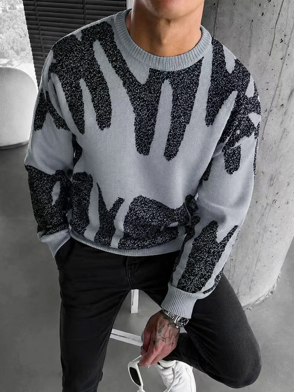 Milo, jersey de punto jacquard con diseño abstracto
