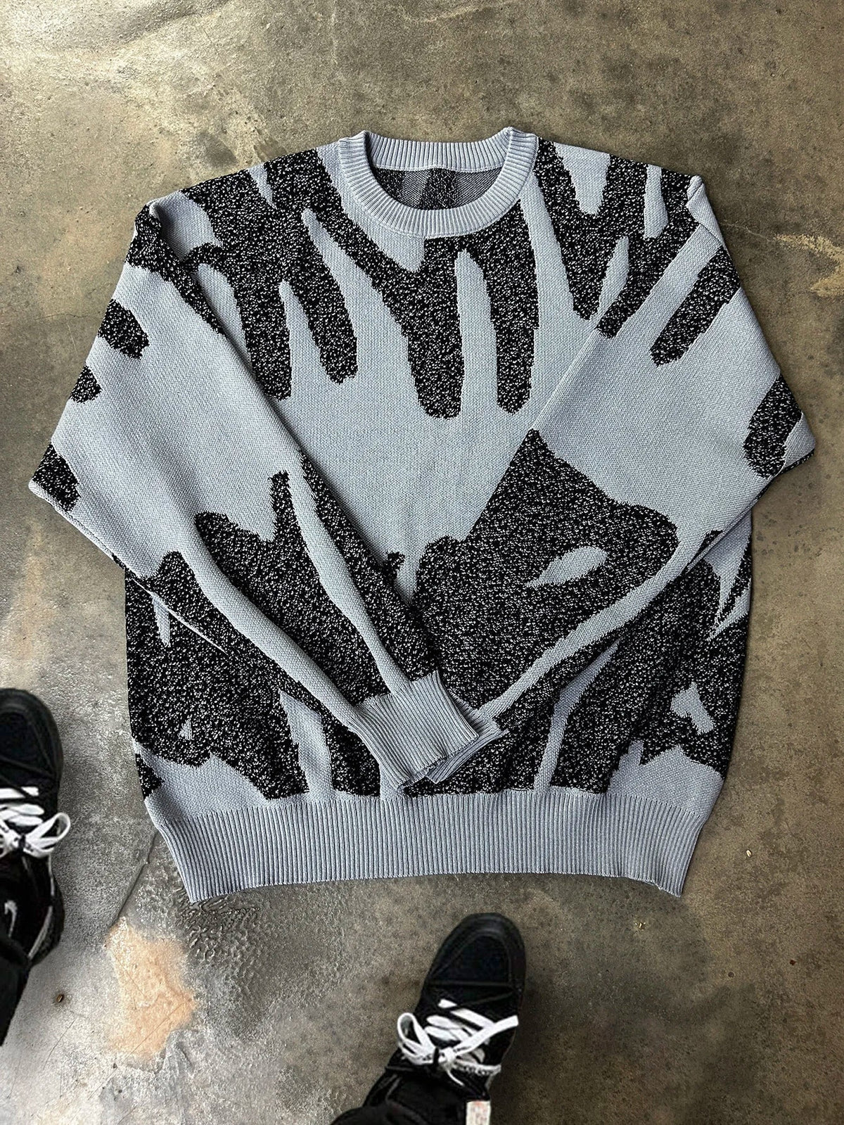 Milo, jersey de punto jacquard con diseño abstracto