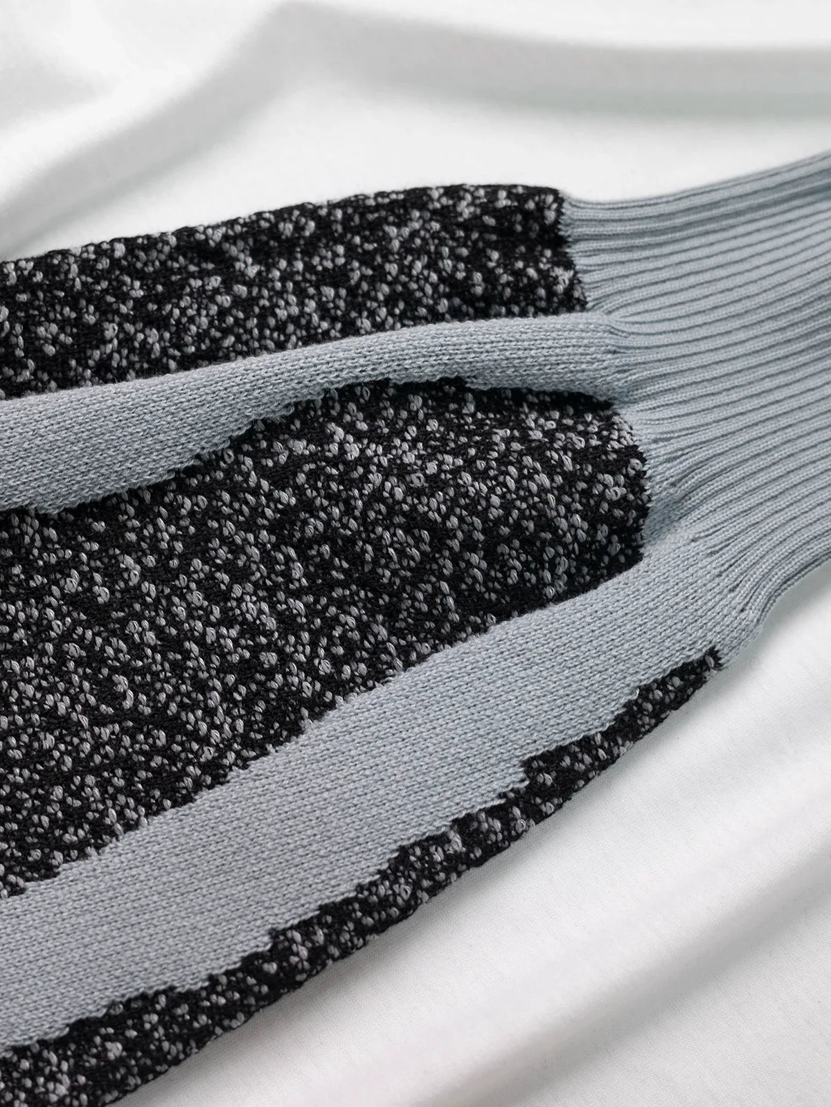 Milo, jersey de punto jacquard con diseño abstracto