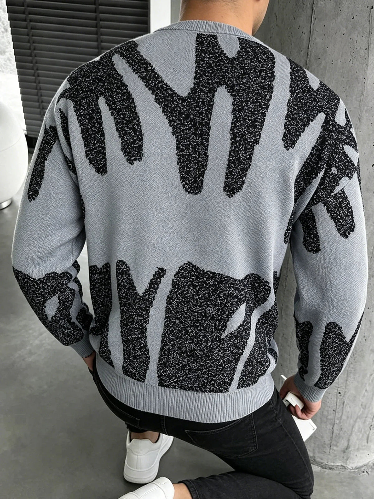 Milo, jersey de punto jacquard con diseño abstracto