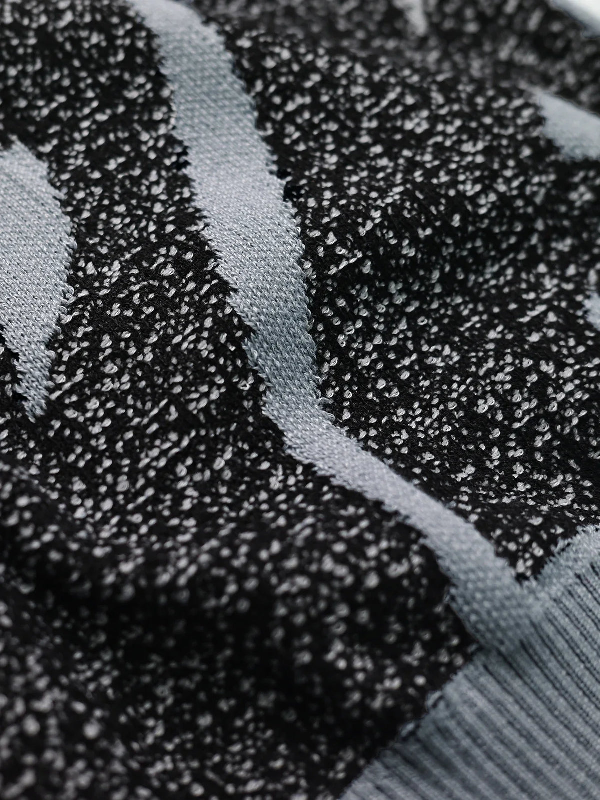 Milo, jersey de punto jacquard con diseño abstracto